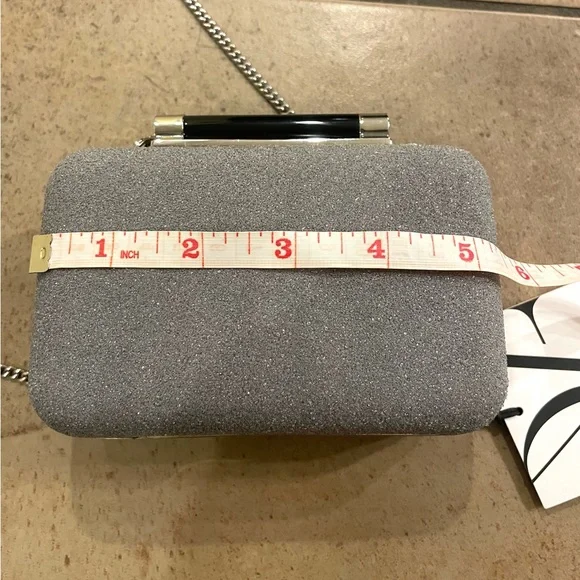 - DVF charming leather and sparkle minaudiere clutch/handbag with removabl…